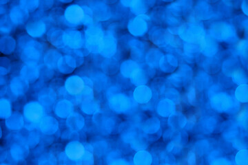 Fototapeta na wymiar defocused festive blue background bokeh celebration holiday