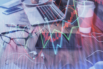 Double exposure of forex chart drawing and cell phone background. Concept of financial trading