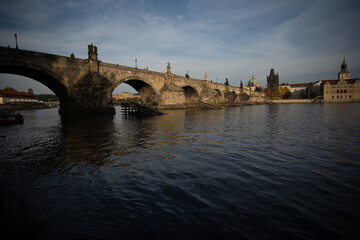 Fototapeta na wymiar Charles Bridge and the Vltava River. stone bridges on the river in the city. in the center of the old town of Prague in the Czech Republic 