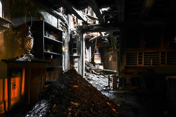 Cornwall, Ct, USA The interior of a wooden house damaged by fire.