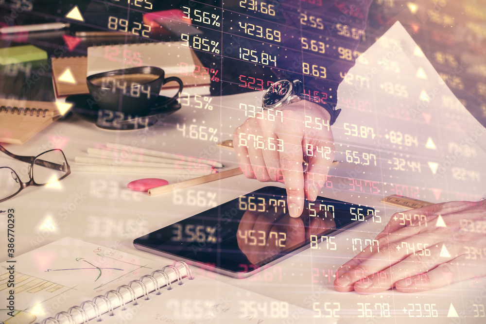 Poster double exposure of man's hands holding and using a digital device and forex graph drawing. financial
