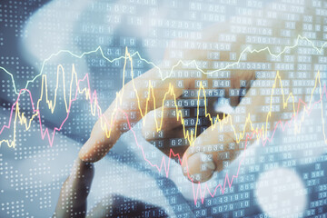 Multi exposure of man's hands holding and using a phone and financial chart drawing. Market analysis concept.