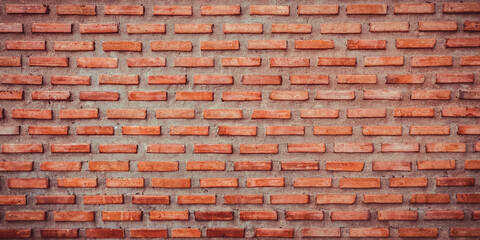 Red brick wall background. colorful horizontal architecture,  Panoramic background of wide brick wall texture.