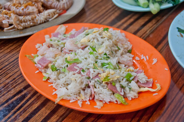 Simple Asian style ham salty fried rice with shredded egg and vegatable in Hong Kong street food cuisine