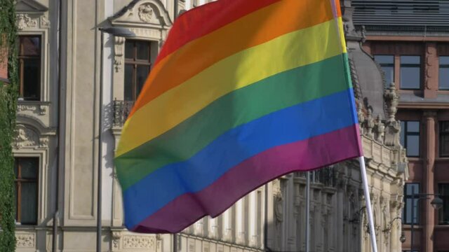 LGBTQ cinematic waving flag close up shot