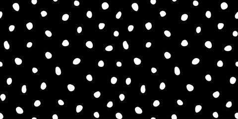 Hipster black and white seamless polka dot pattern. Vector irregular abstract texture with random hand drawn spots. © Oleksandra