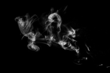 White natural steam smoke effect on solid black background with abstract blur motion wave swirl use...