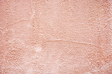 rough pink cement background of old texture on the wall