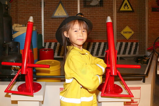 Imagination of children.Children and learning.The child is playing as a firefighter. - Powered by Adobe