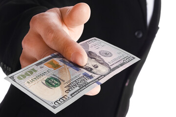 Business man holding money on white background