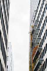 Fototapeta premium Close-up telephoto view of French new residential district with modern apartment and offices buildings with large lodges