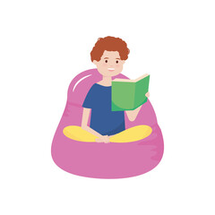 young man reading a book sitting on bean chair