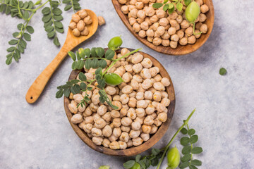 Dry chickpeas or garbanzo beans in wooden  bowl, healthy food ingredient