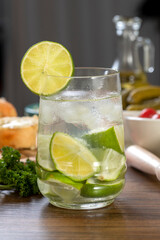 Caipirinha, typical Brazilian cocktail made with lemon (selective focus; close-up shot)