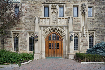 Fototapeta na wymiar entrance to a Catholic secondary in a gothic building