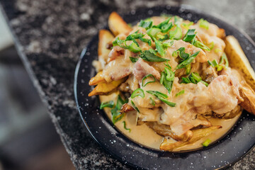 Papas fritas con queso