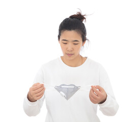 The lady demonstrates the correct way to wear a mask