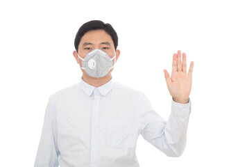 Man wearing a mask raises his left hand