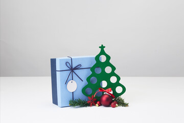 Decorated Christmas balls and Christmas tree with gift box