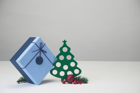 Decorated Christmas balls and Christmas tree with gift box
