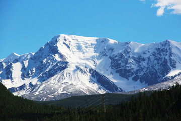 Fototapeta na wymiar Snow-capped mountains of Altai near