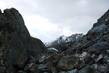 View of the snow-capped mountains from the rocky gorge