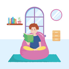 stay safe, teen reading book sitting on chair, during covid 19 quarantine