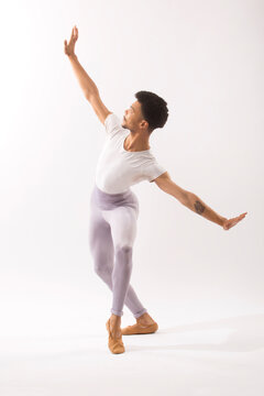 Young Black Male Ballet Dancer Showing His Skills In The Studio.