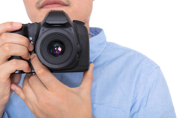 Male photographer shooting with SLR camera