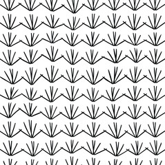 A cluster of identical bushes with thin, sharp branches. 