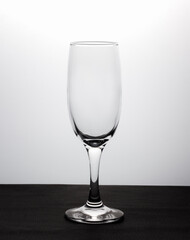 empty champagne glass on a white background