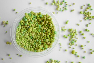 fertilizer pellets on white background