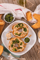 Friselle with turnip tops and hummus.