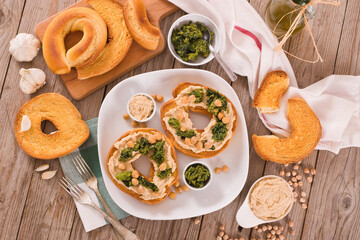 Friselle with turnip tops and hummus.