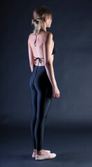 female figure in clothes, studio portrait