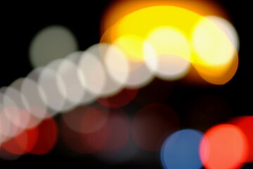 abstract background of colorful lights in the city - 386829404