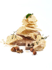 food photography of parmesan cheese side view on wooden cutting board close up on white background...