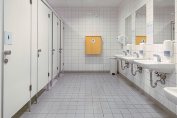 Fototapeta na wymiar Public toilet, restroom, lavatory doors, baby changing table