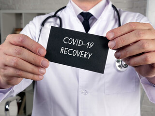 Health care concept meaning COVID-19 RECOVERY with phrase on the page.