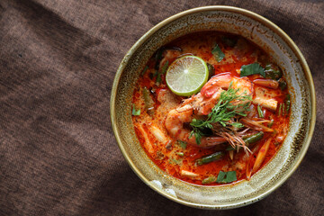 Tom Yum soup , a Thai traditional spicy prawn soup