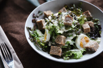 caesar salad appetizer on wooden background