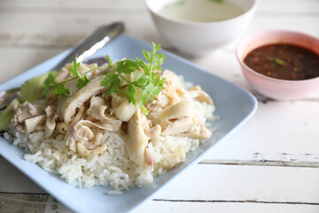 Thai food gourmet steamed chicken with rice in wood background
