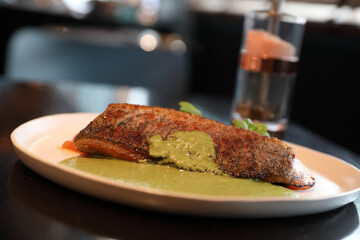 Sea bass fillet with pesto sauce