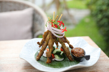 Chicken Satay on dark brown table street food appetizer