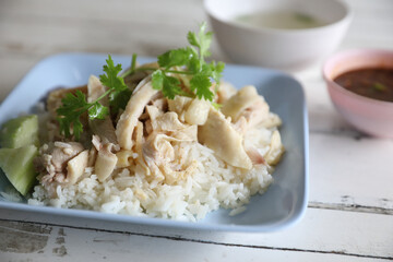Thai food gourmet steamed chicken with rice in wood background