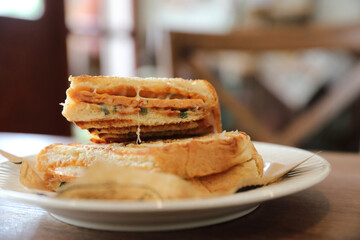 Panini with ham and sausage sandwich