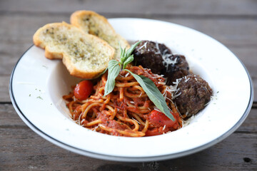 Spaghetti Meatballs on wood background