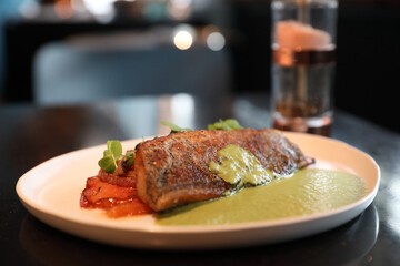 Sea bass fillet with pesto sauce