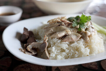 Thai food gourmet steamed chicken with rice in wood background