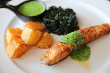 Salmon steak with pesto sauce